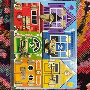 Melissa & Doug Colorful Latches Board with Numbers